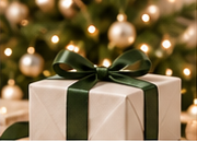 Ivory Christmas present tied with dark green ribbon